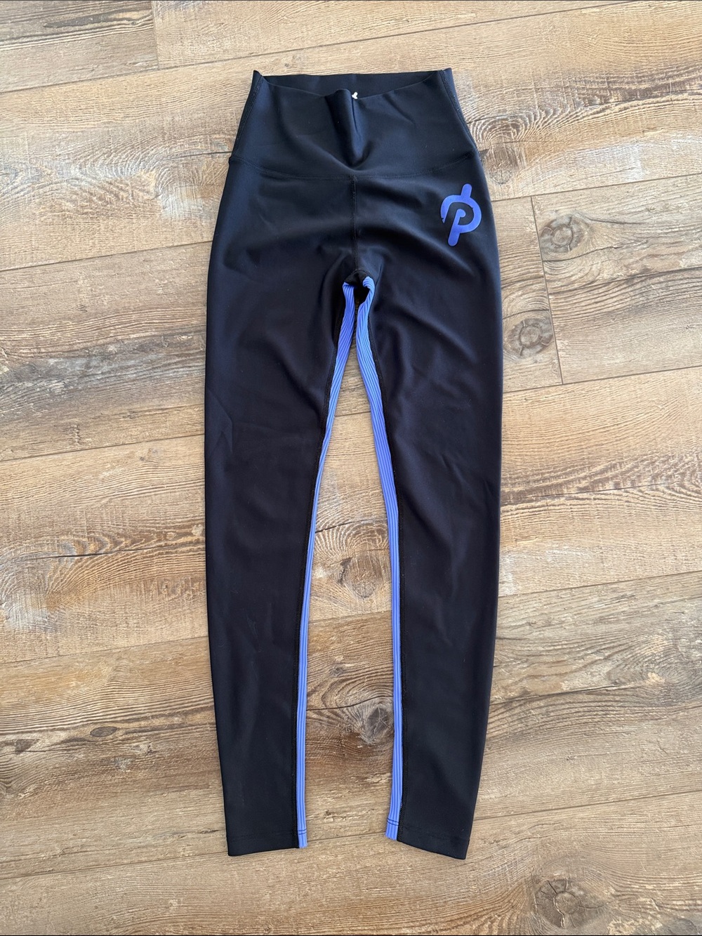Peloton Black Leggings with Purple Trim and Logo